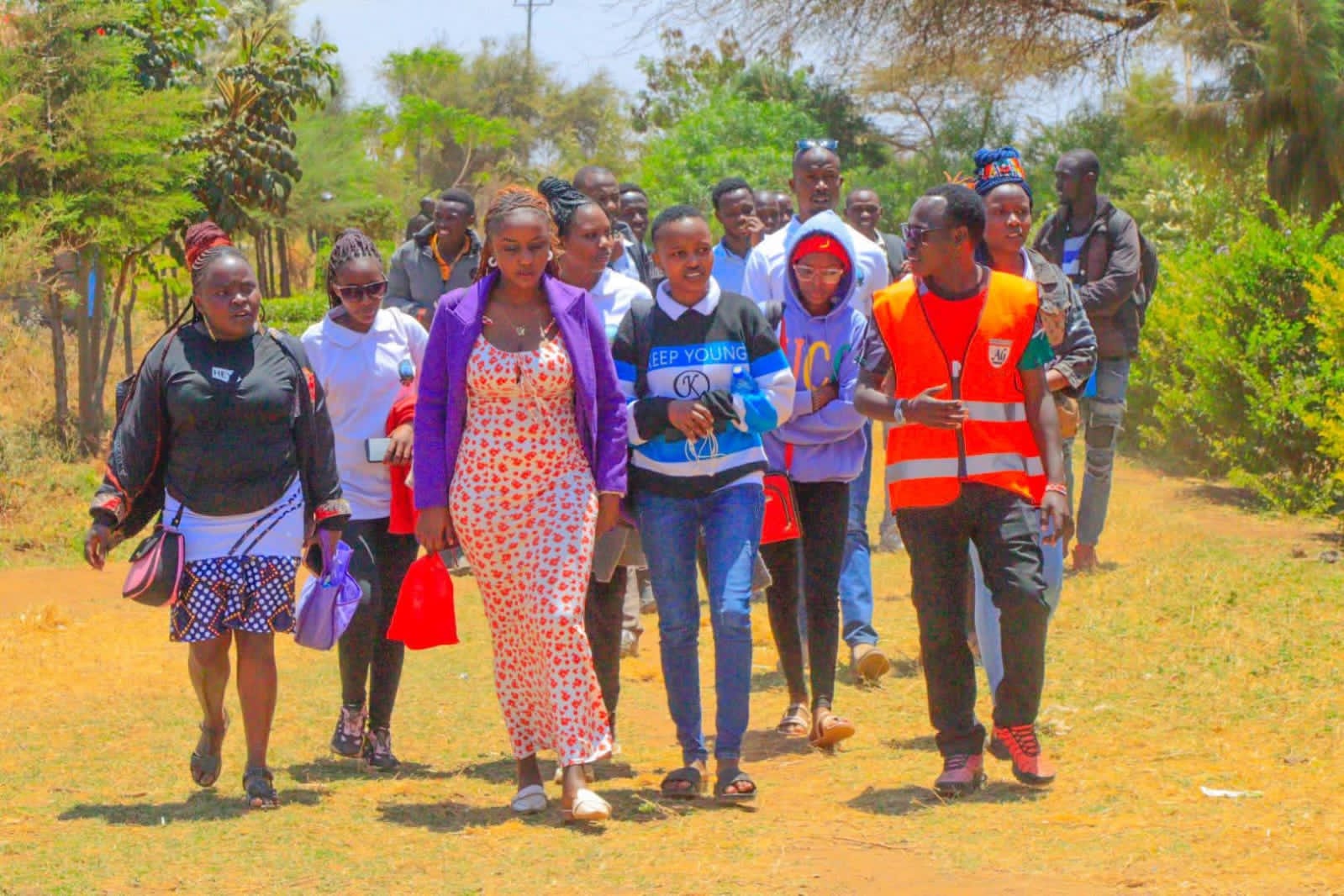 OOTI trainees walking together on campus grounds